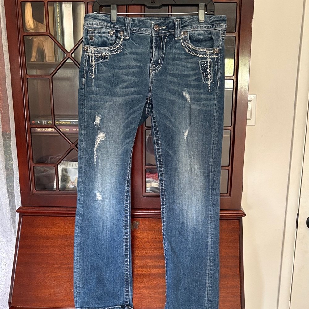 Women's Distressed Blue Jeans